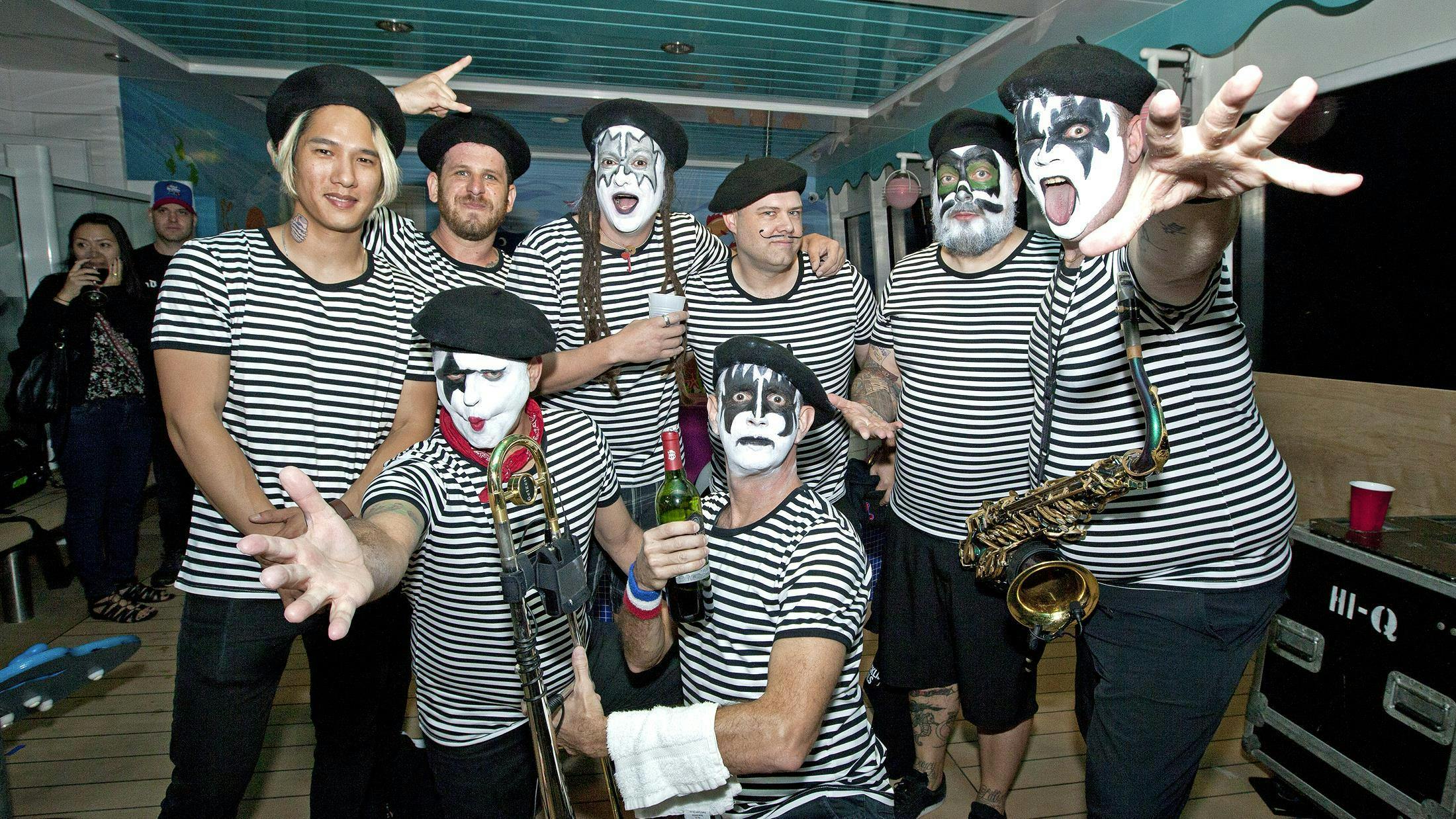 Less Than Jake and crew transform into French Kiss for their performance.