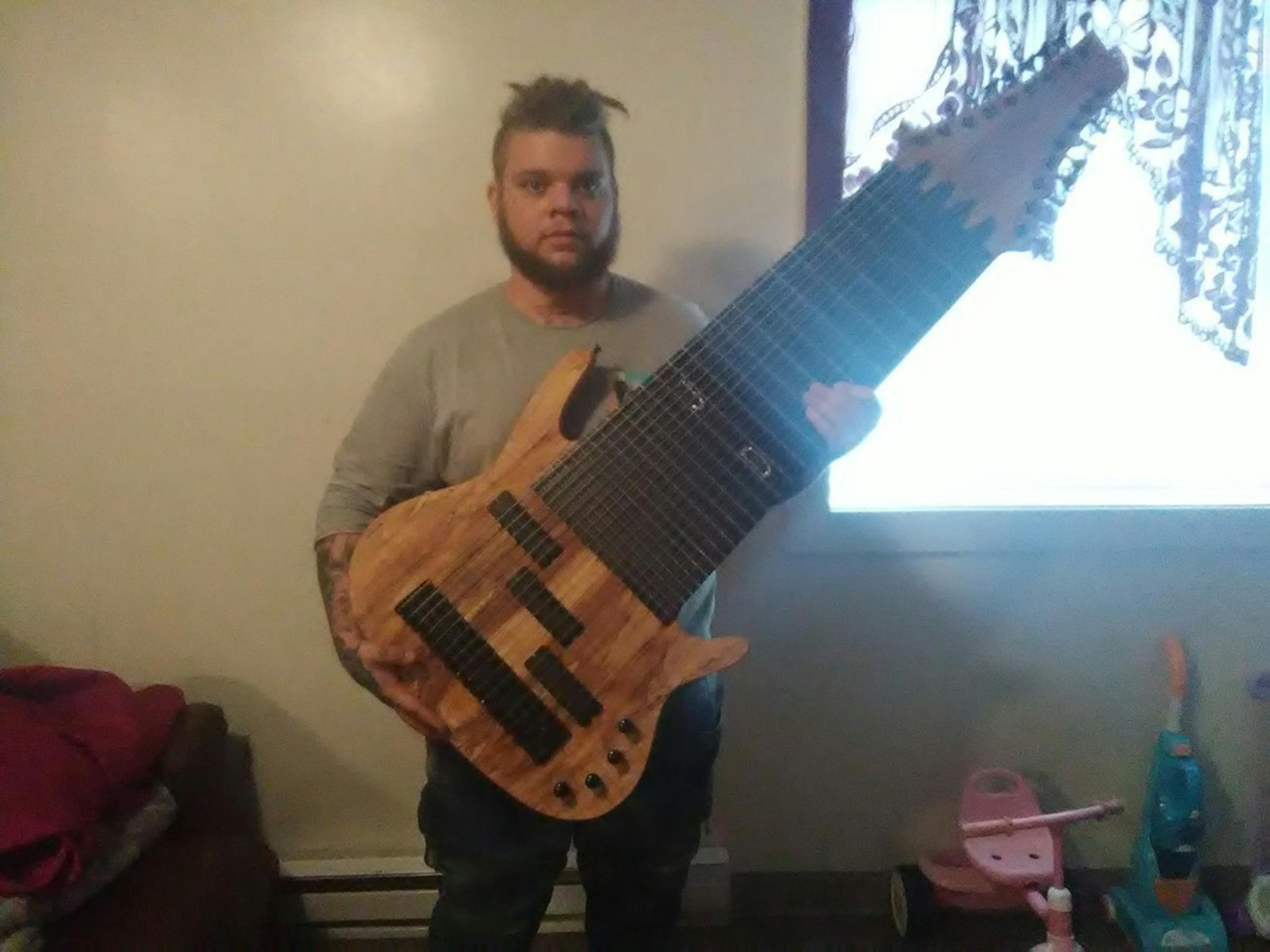 Check Out Jared Dines Taking His 17 String Guitar To Task