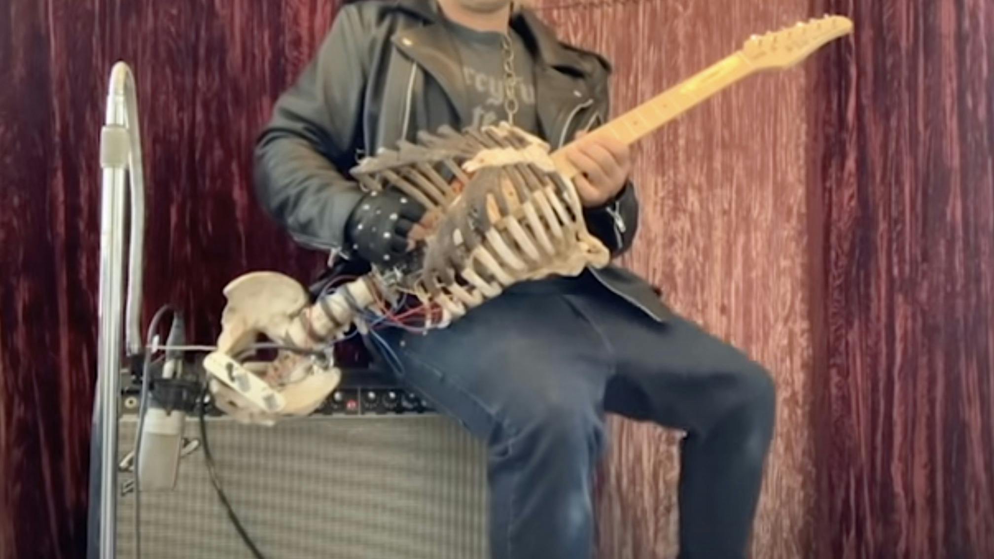 This guy made a working guitar out of his dead uncle’s skeleton