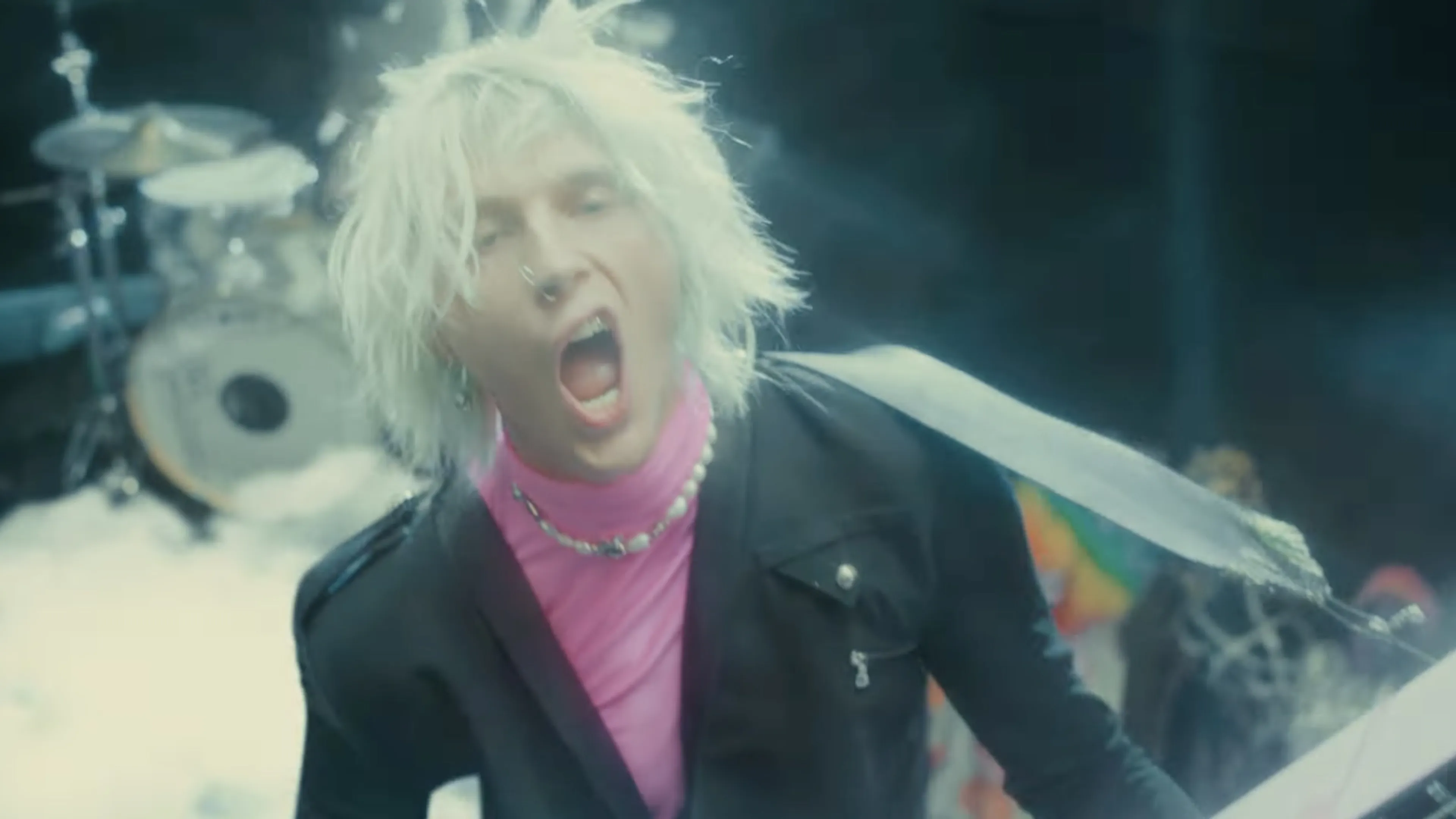 Machine Gun Kelly's message to those complaining about his genre-switching: "Shut the f*ck up, god damn!"