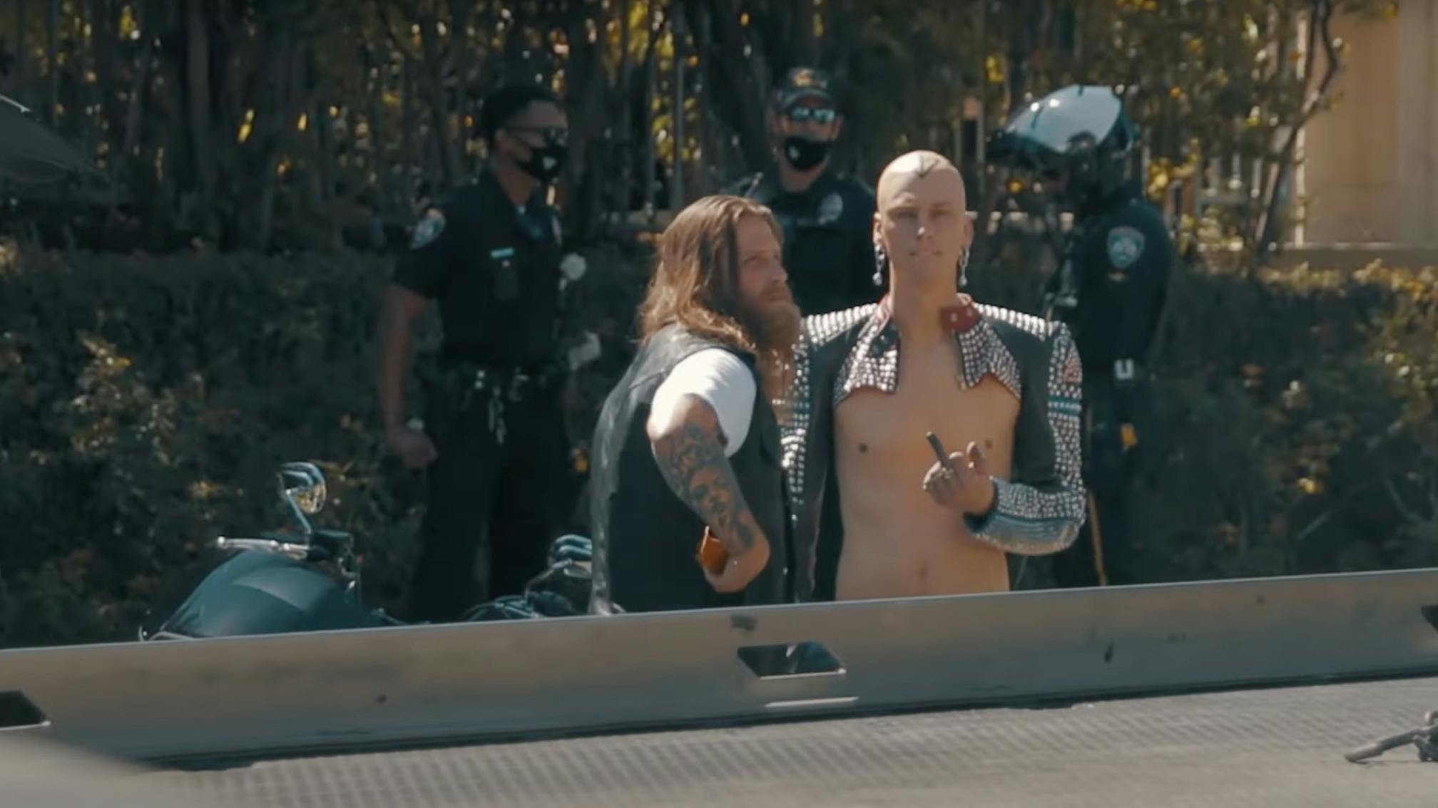 Machine Gun Kelly gets pulled over by police in making-of papercuts video 