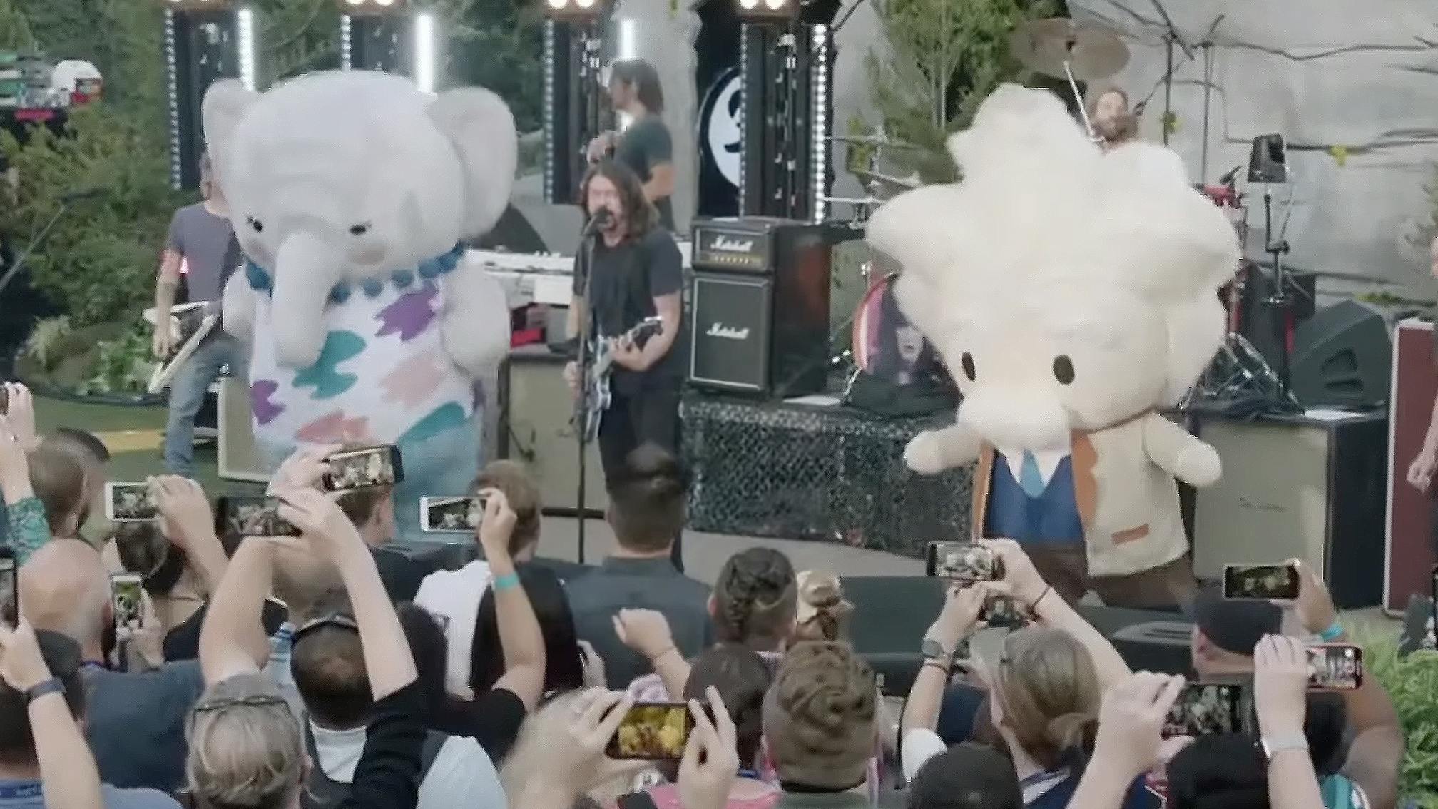 "Just when you thought the band couldn't get any bigger…" Foos perform live with weirdly cute dancing mascots