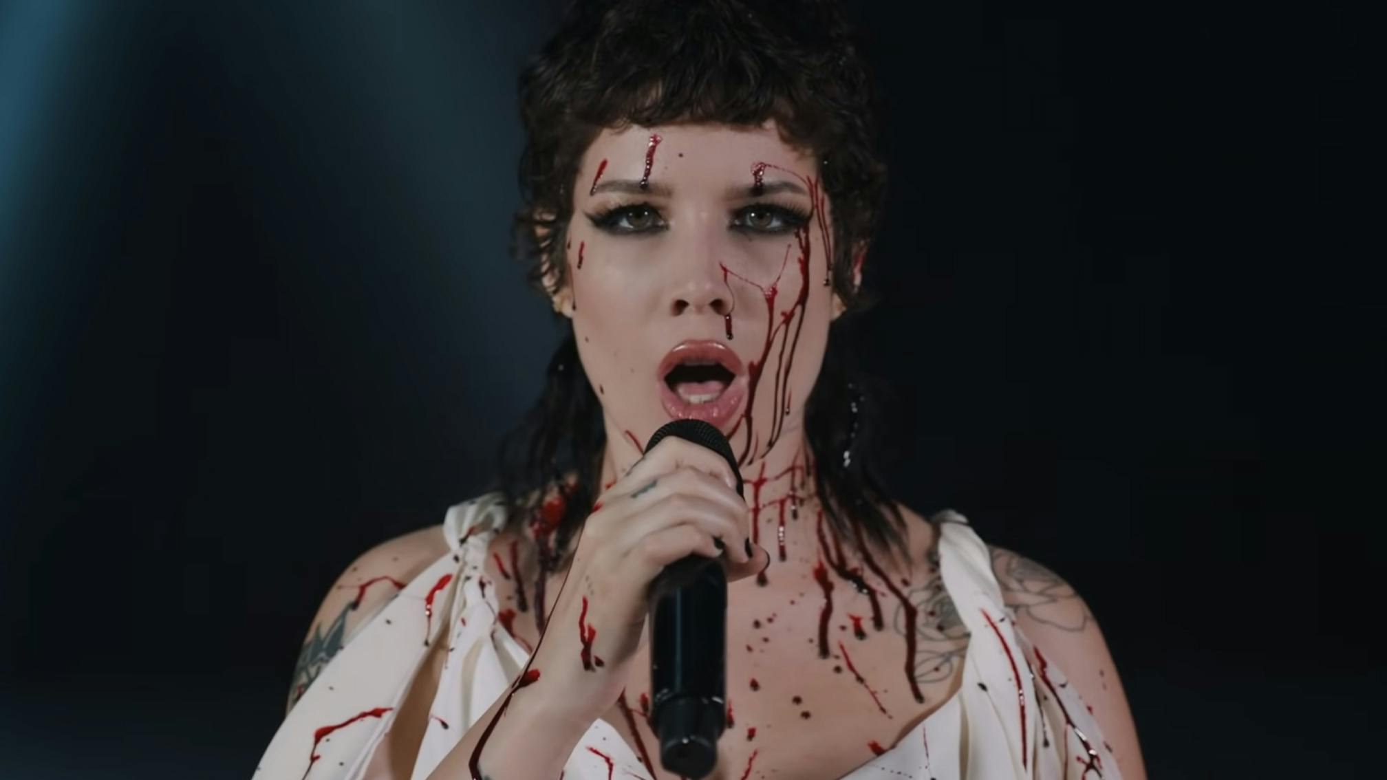 Halsey drops blood-soaked I am not a woman, I'm a god live video
