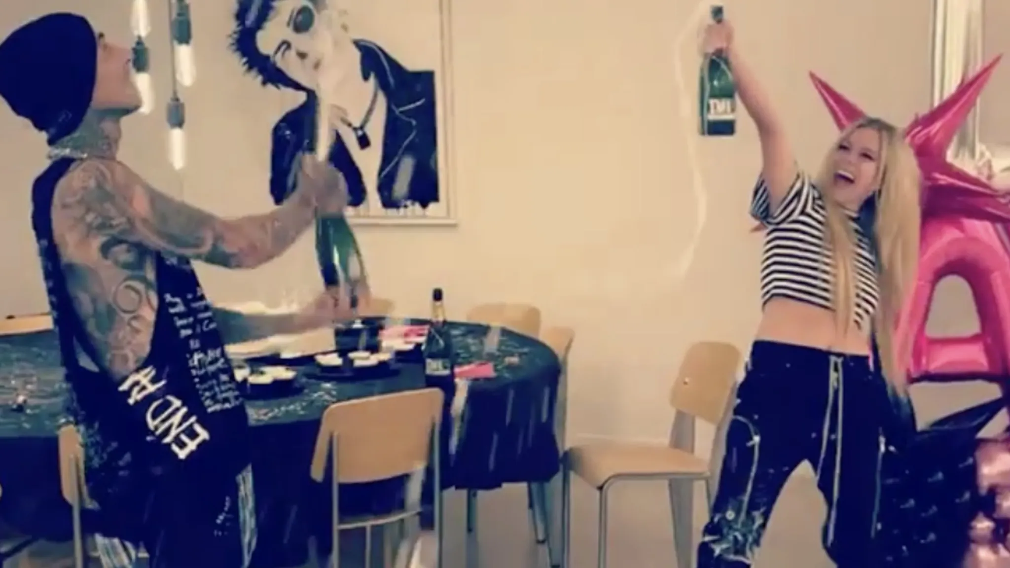 Avril Lavigne signs to Travis Barker’s record label DTA,… Kerrang!