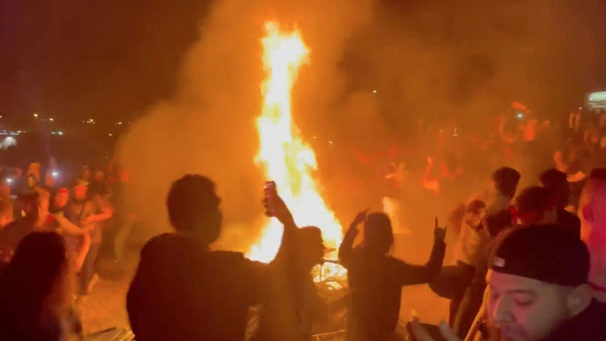 See Maggots circle-pit around an actual bonfire at Slipknot show