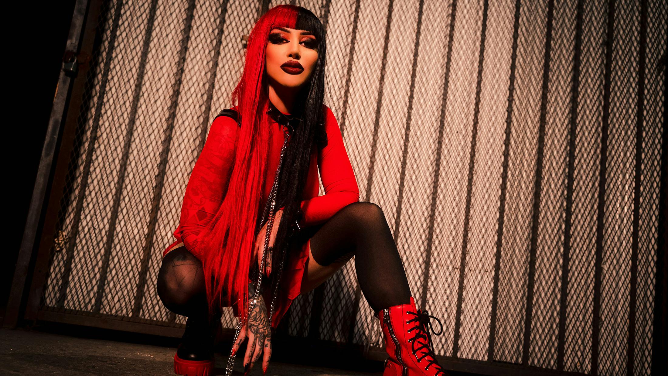 The People Vs. Ash Costello: New Years Day’s vocalist on finding confidence, making music for Rhea Ripley, and her odd choice of comfort movie