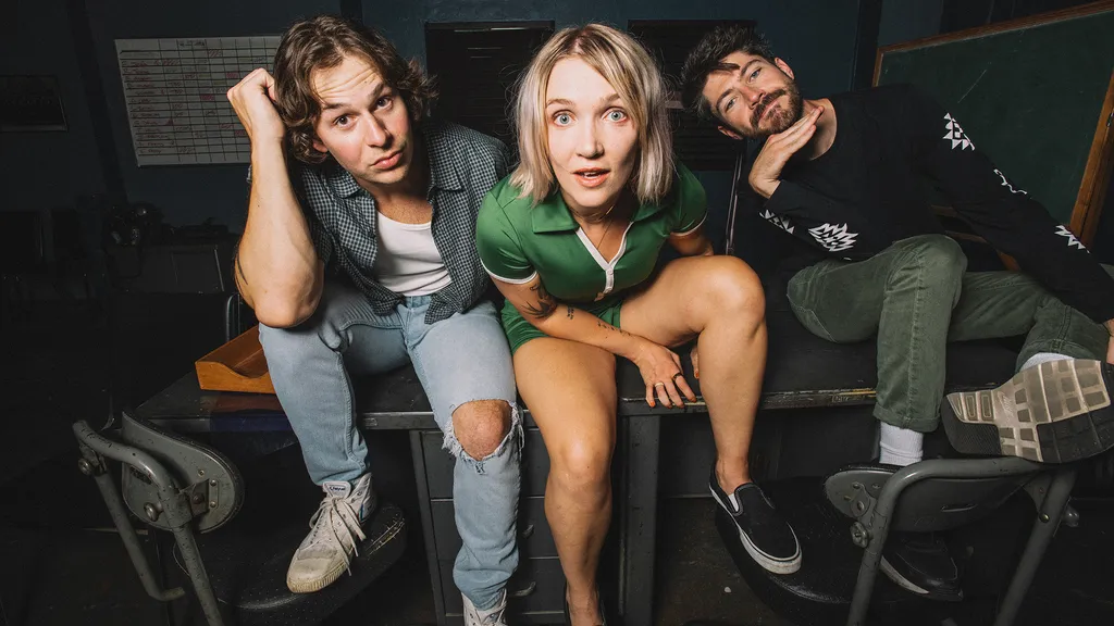 The band Winona Fighter posing to camera, photographed by Lindsey Byrnes