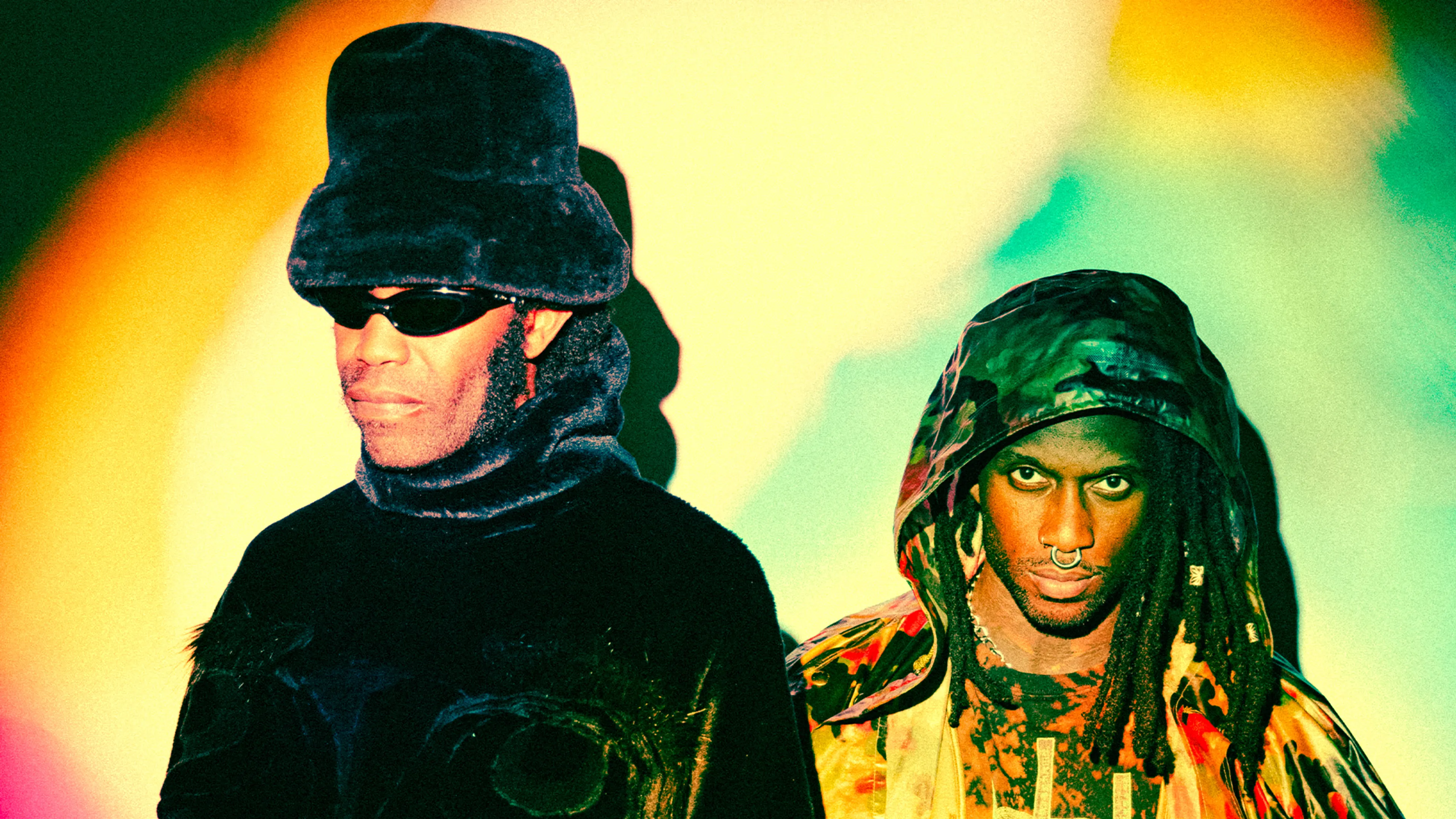 A picture of rap-metal duo ho99o9 in atmospheric lighting