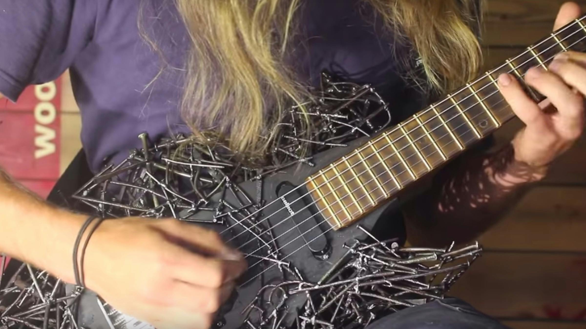 This Guitar Made Of Nails Is Literally Metal AF