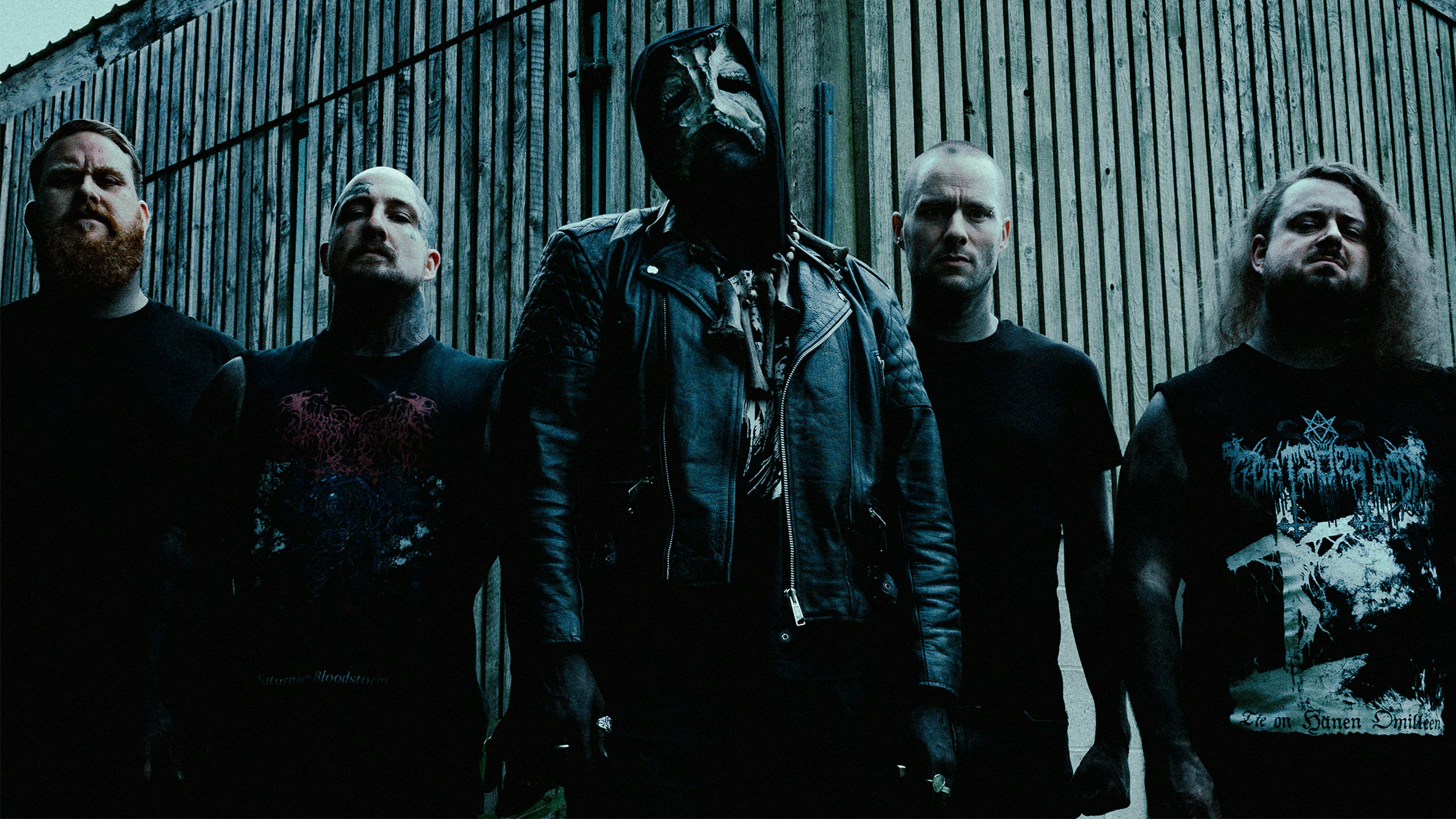 A photo of British black metal band Abduction, with singer AV in his mask