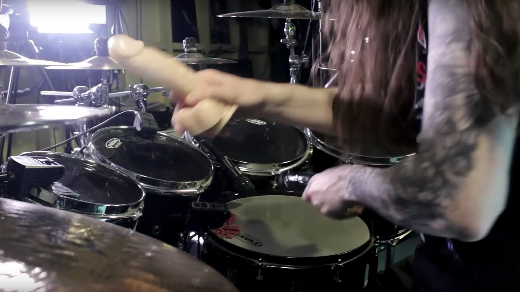 Watch This Guy Play AC/DC's Back In Black Using Dildos