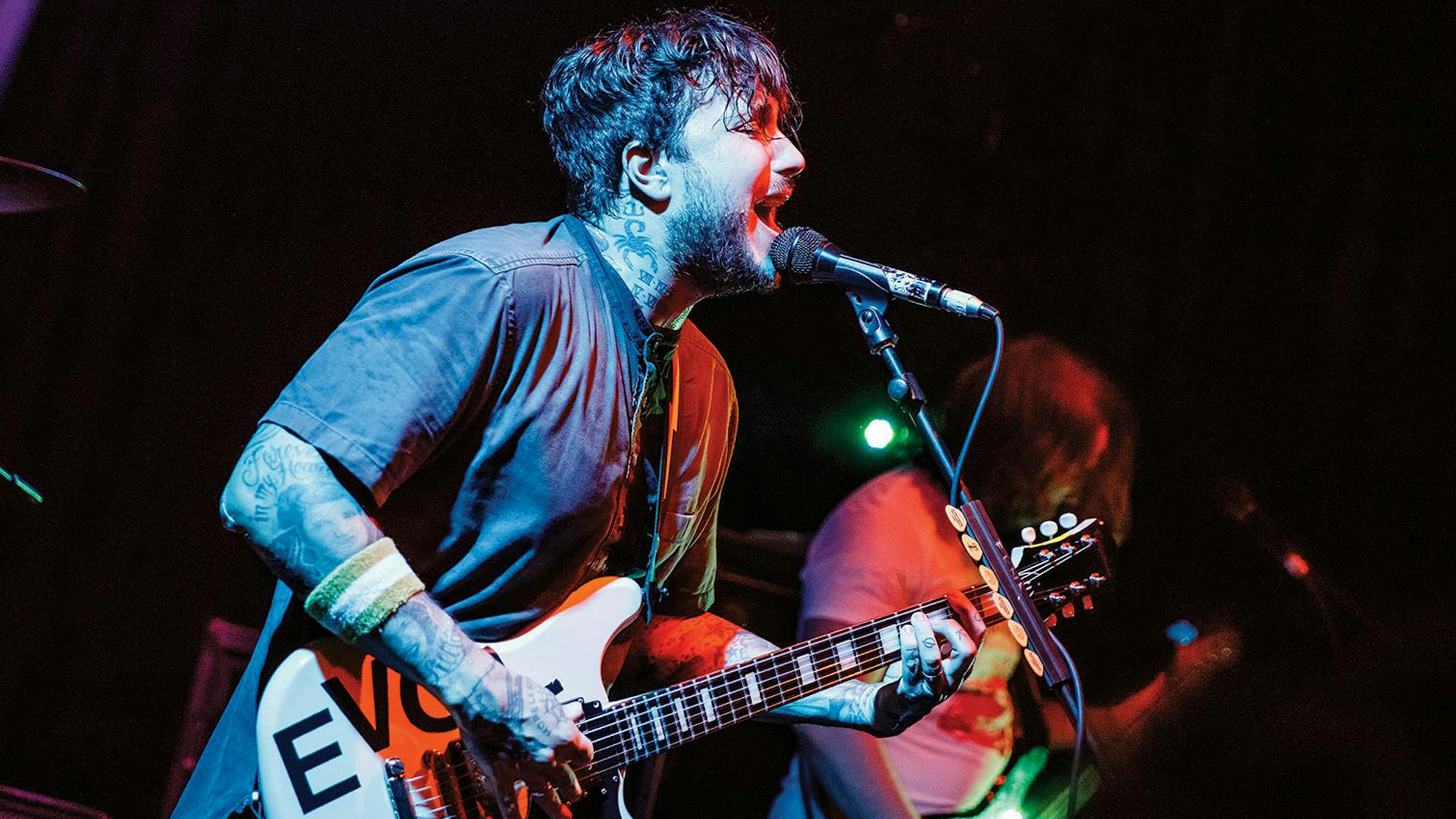 Sing-alongs, stretching and… scrubbing?! Life on the road with Frank Iero