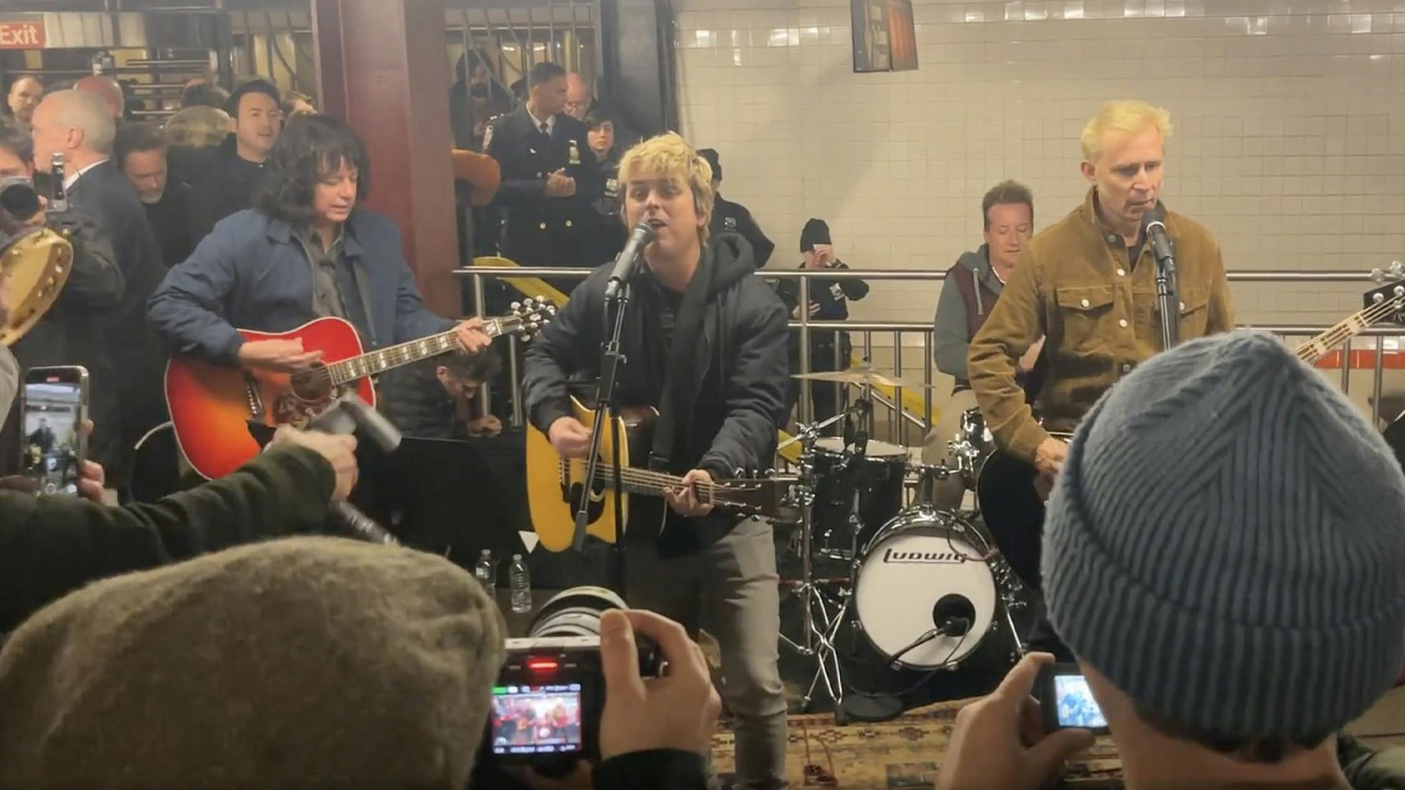 Green Day played a surprise set at a subway station in New York last night