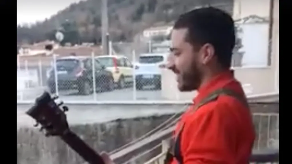 Italian Guitarist Playing Slayer On Balcony