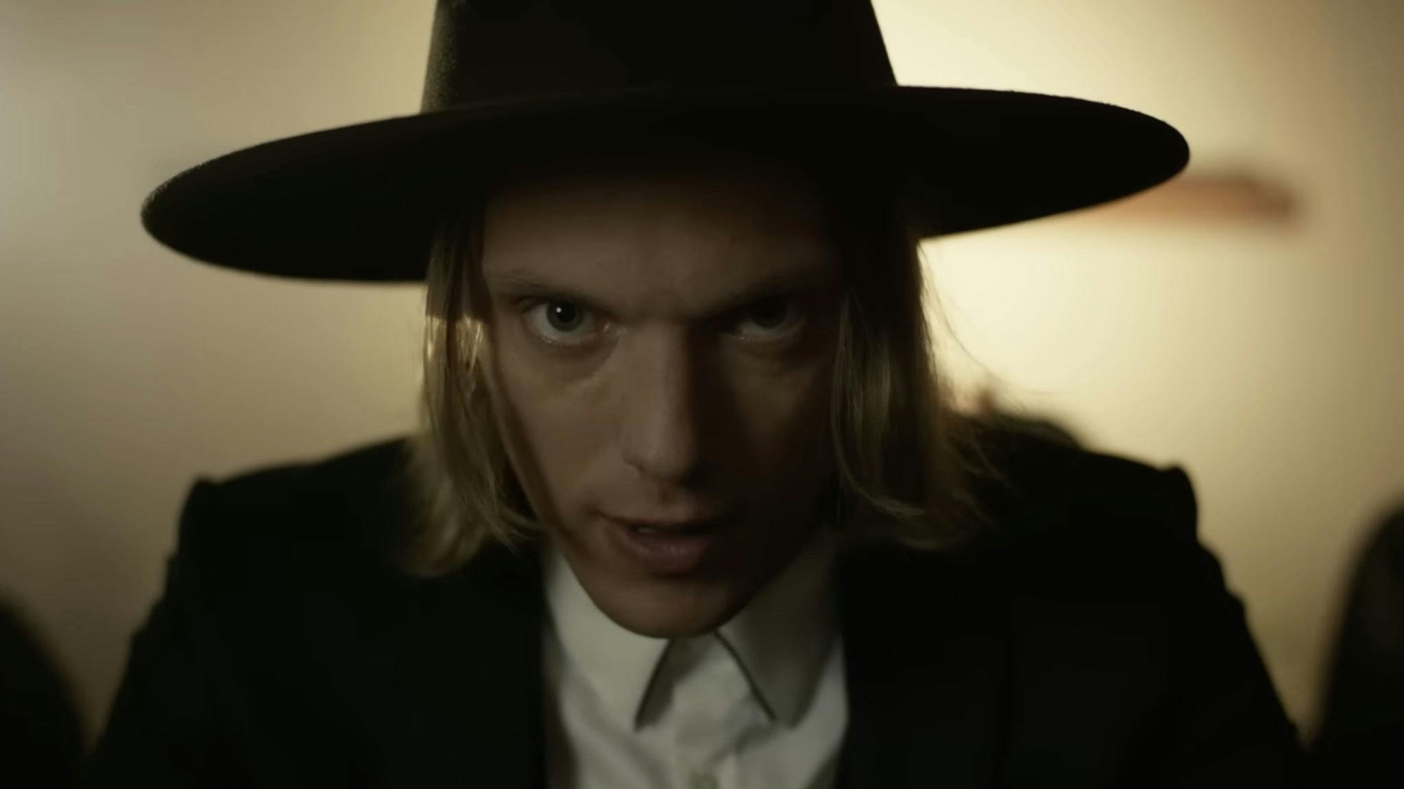 Jamie Campbell Bower unveils sinister, Western-esque single I Am