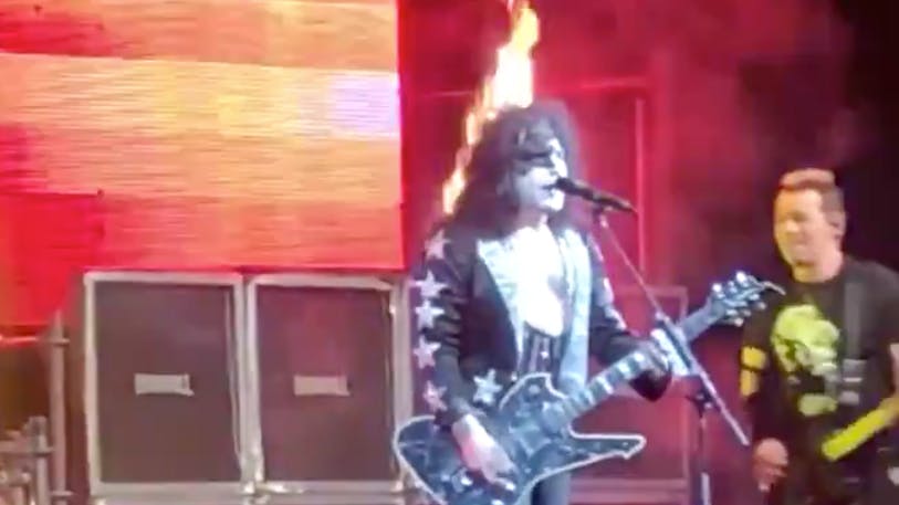 Singer Of Tribute Band Catches Fire During Set – But Keeps Playing!