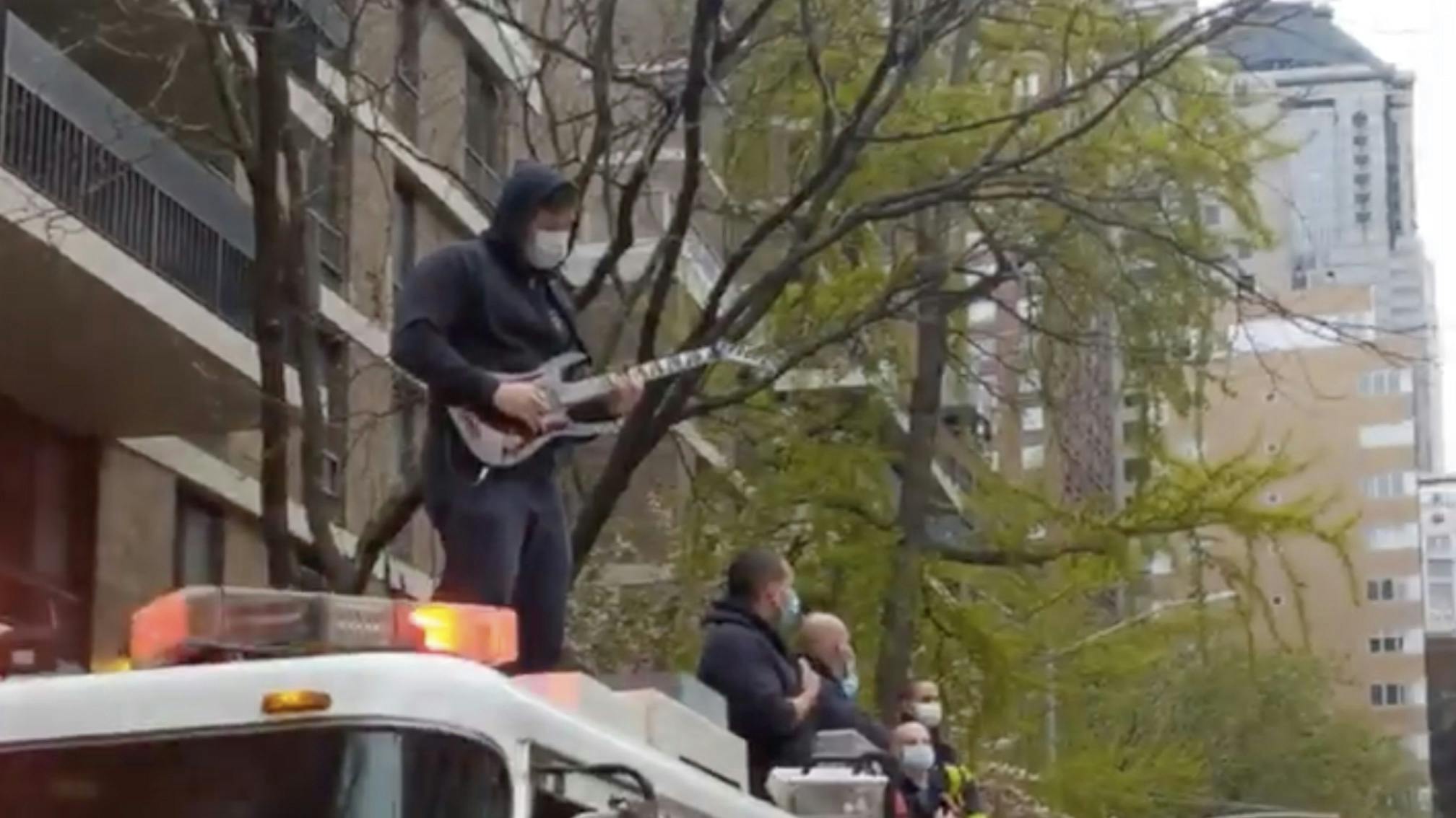 Watch This Metalhead Firefighter Shred The National Anthem On Top Of A Fire Engine