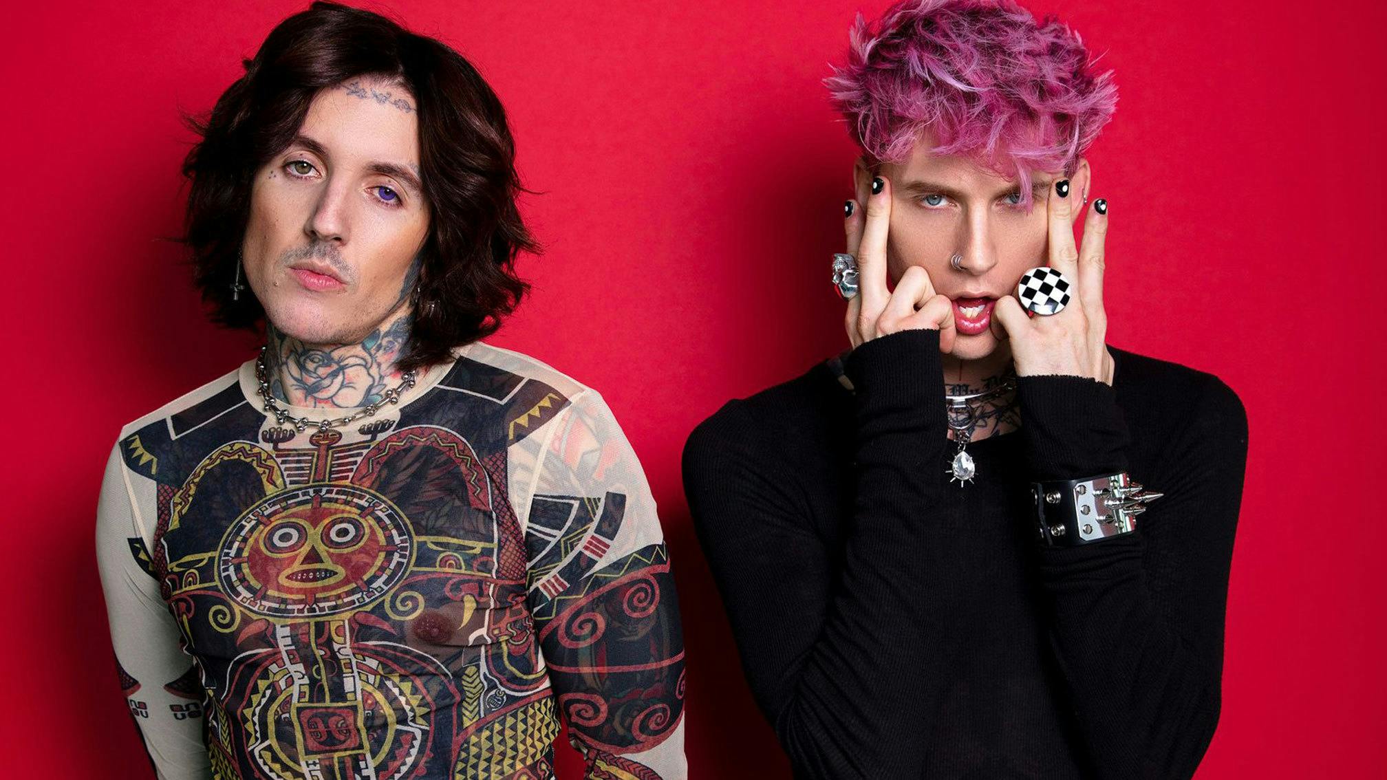 See Oli Sykes join MGK onstage for their first live performance of Maybe