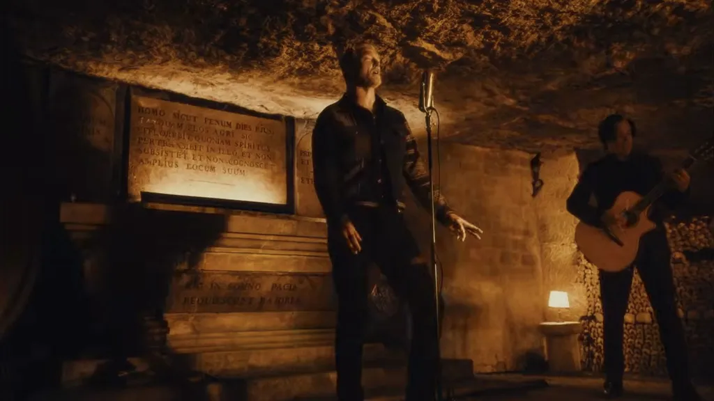 Queens Of The Stone Age Alive in the Catacombs You Tube still