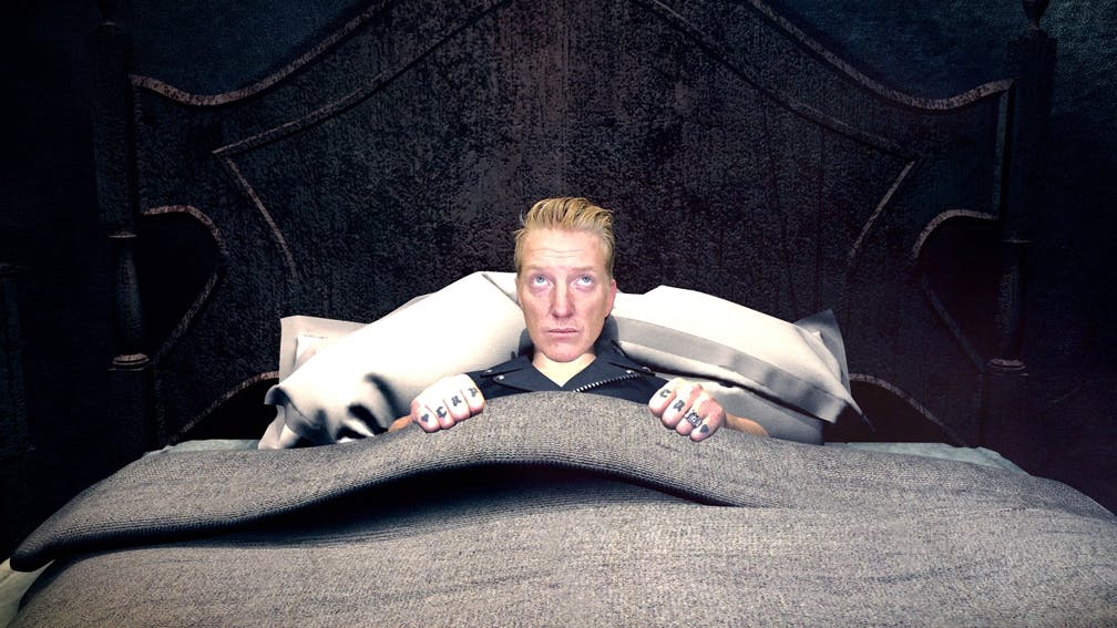 Watch Queens Of The Stone Age's New Head Like A Haunted House Video