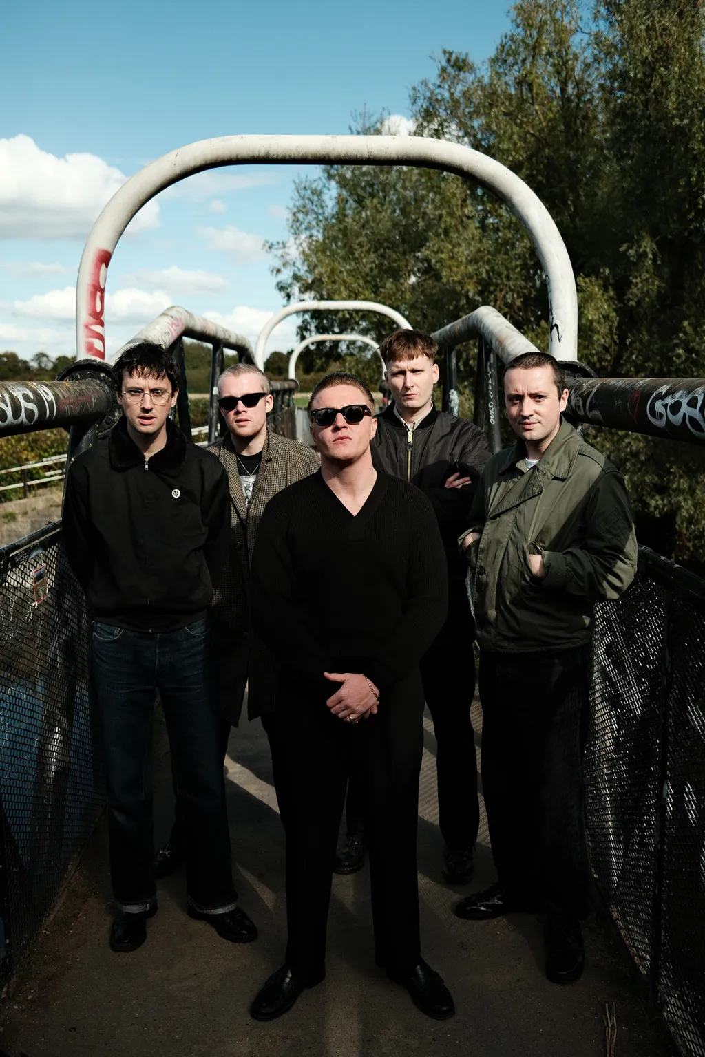 Rifle January 2026 band promo credit Jack Taylor Gotch full length portrait