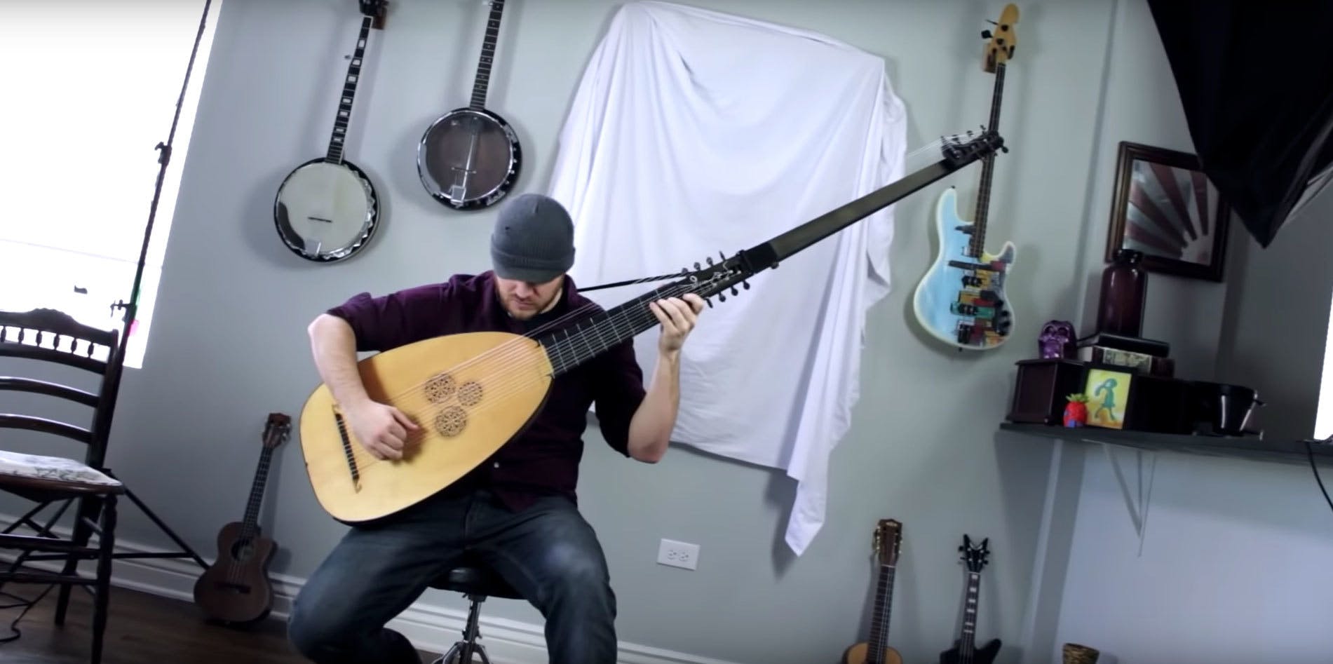 Watch Rob Scallon Play Metal On A 14-String Theorbo