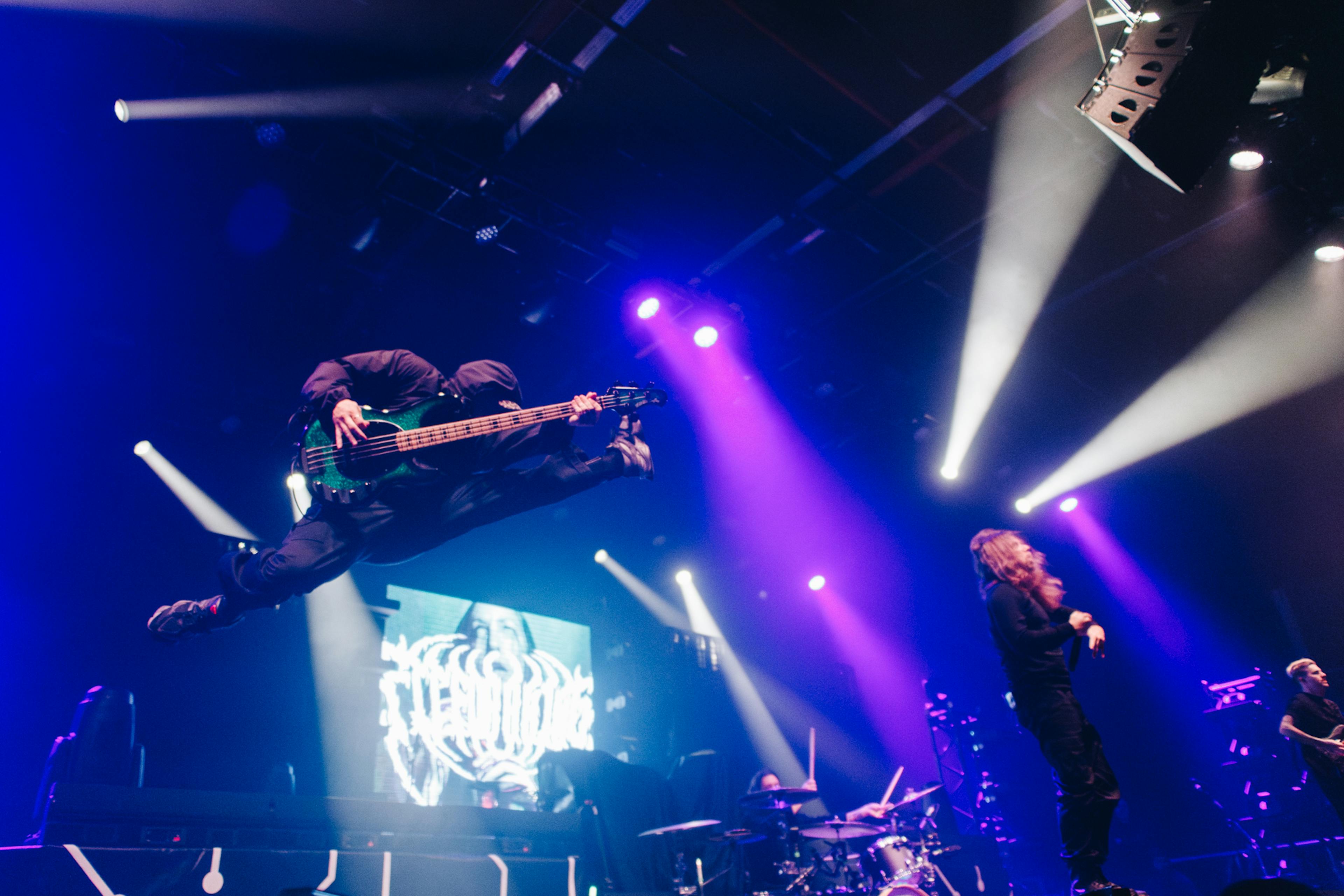 A shot of the band Fit For A King onstage in Manchester