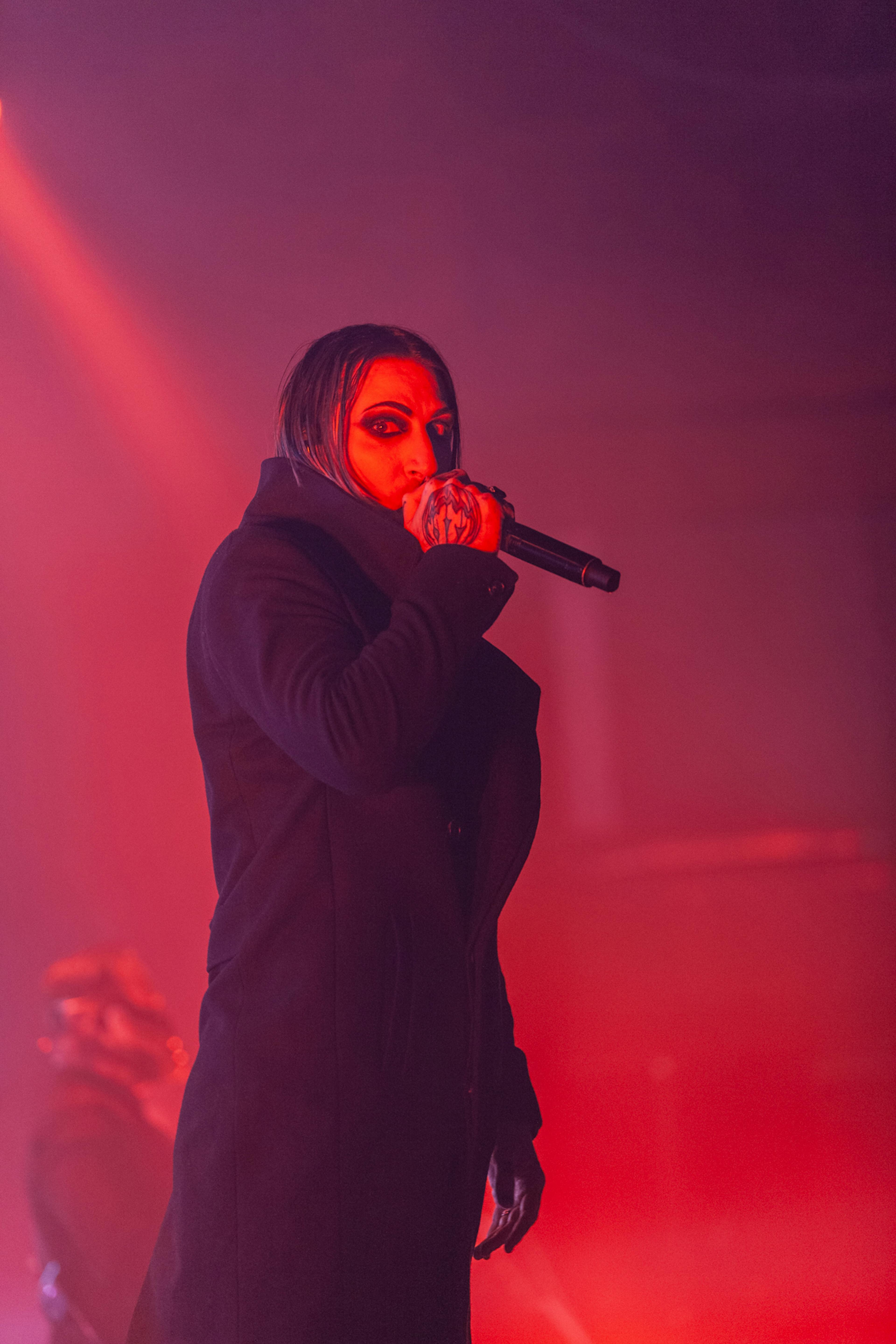 A shot of the gothic metal band Motionless In White onstage in Manchester