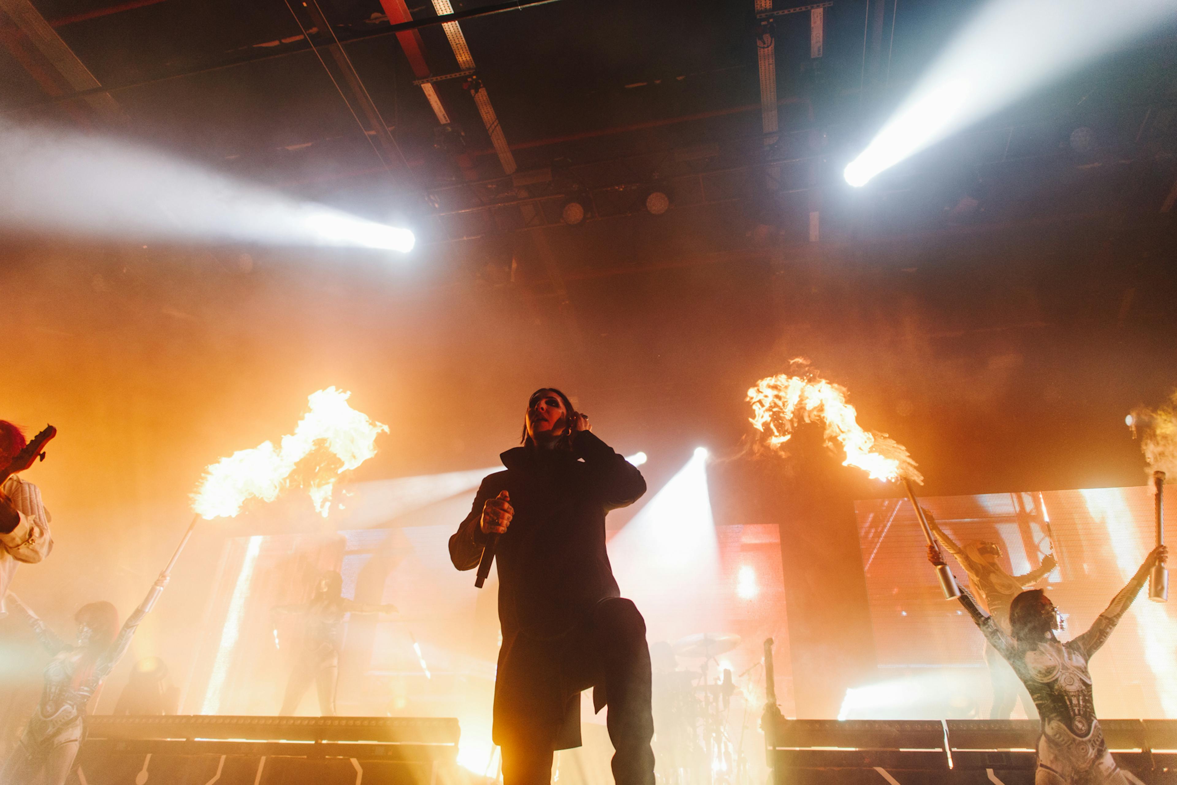 A shot of the gothic metal band Motionless In White onstage in Manchester